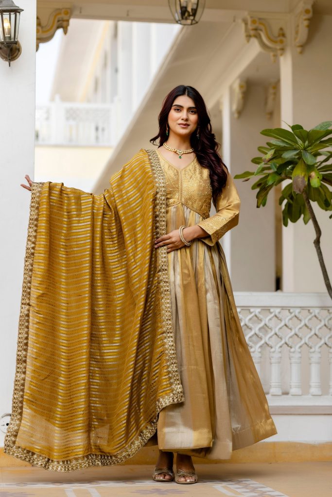 Golden Viscose Banarasi Silk Embellished Gown